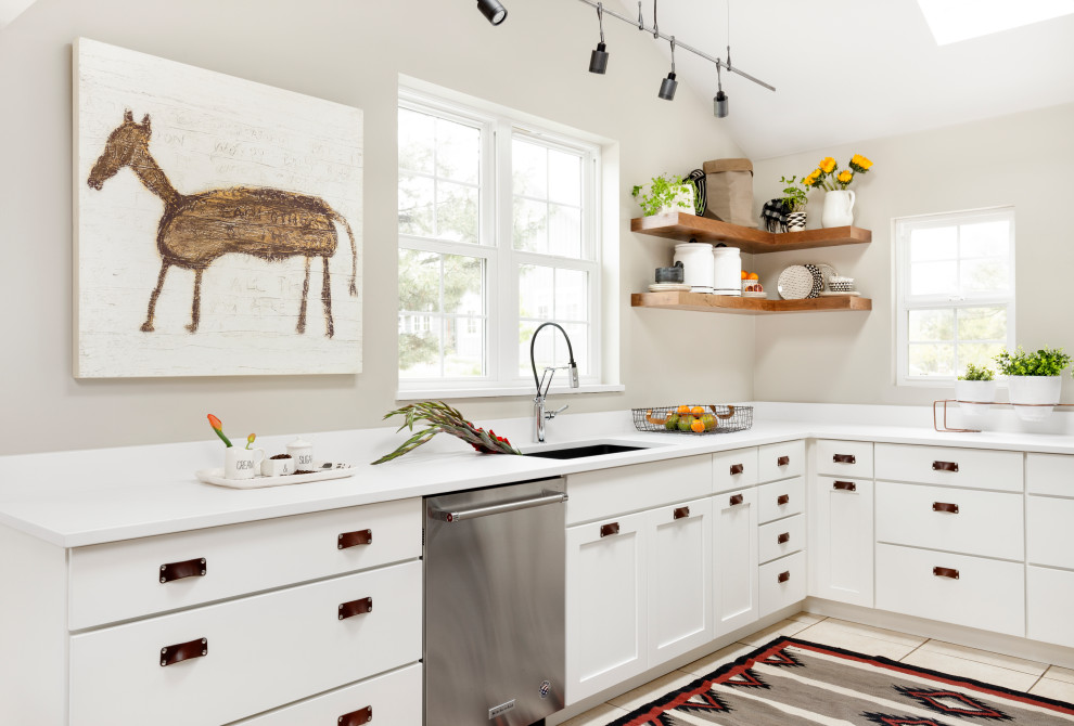 Example of a country home design design in Denver