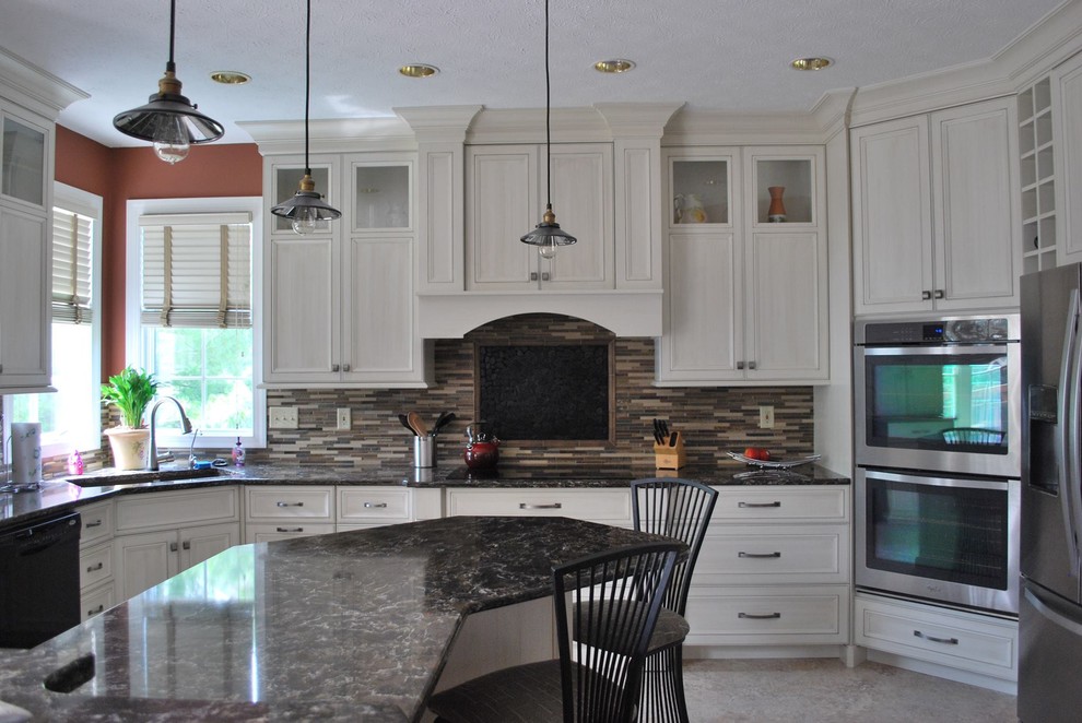 Example of a large l-shaped porcelain tile eat-in kitchen design with a double-bowl sink, beaded inset cabinets, white cabinets, marble countertops, brown backsplash, matchstick tile backsplash, stainless steel appliances and an island