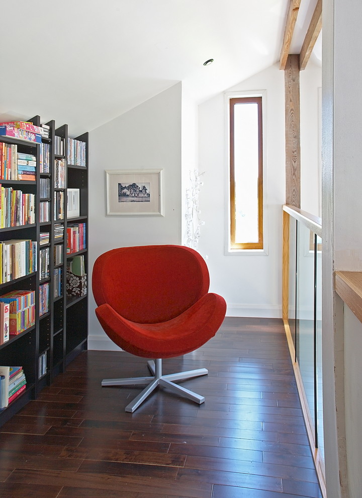 Photo of a small contemporary home office in Other with white walls and dark hardwood floors.