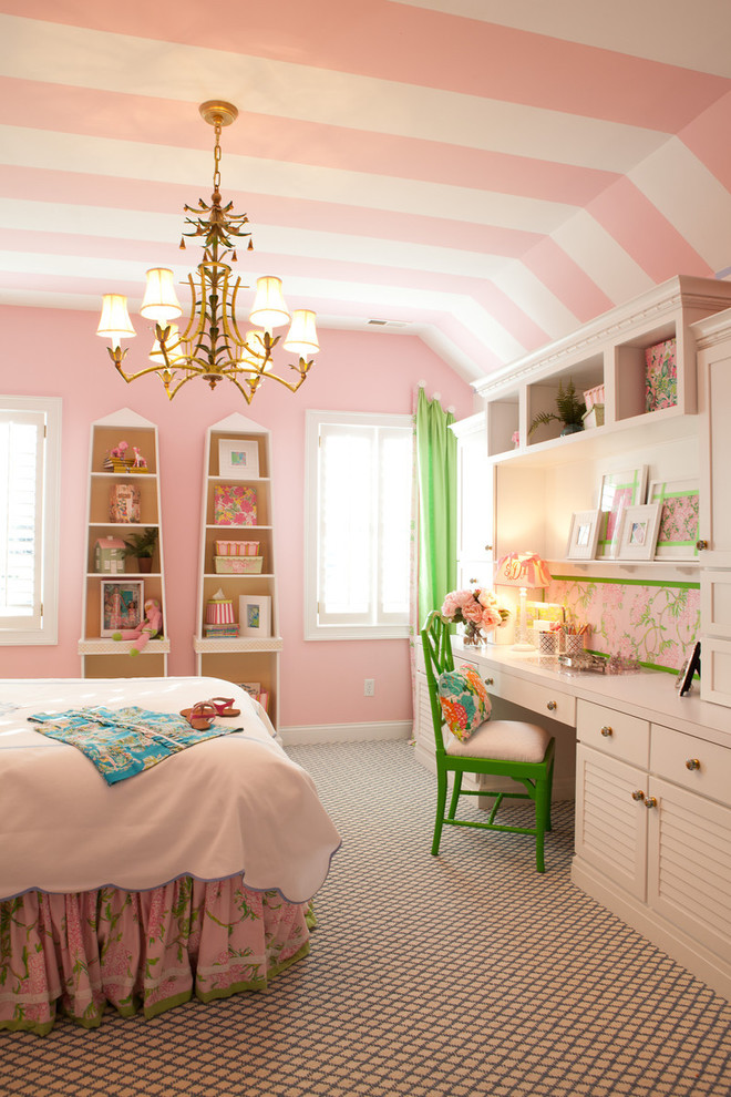 Traditional kids' room in Other with pink walls.