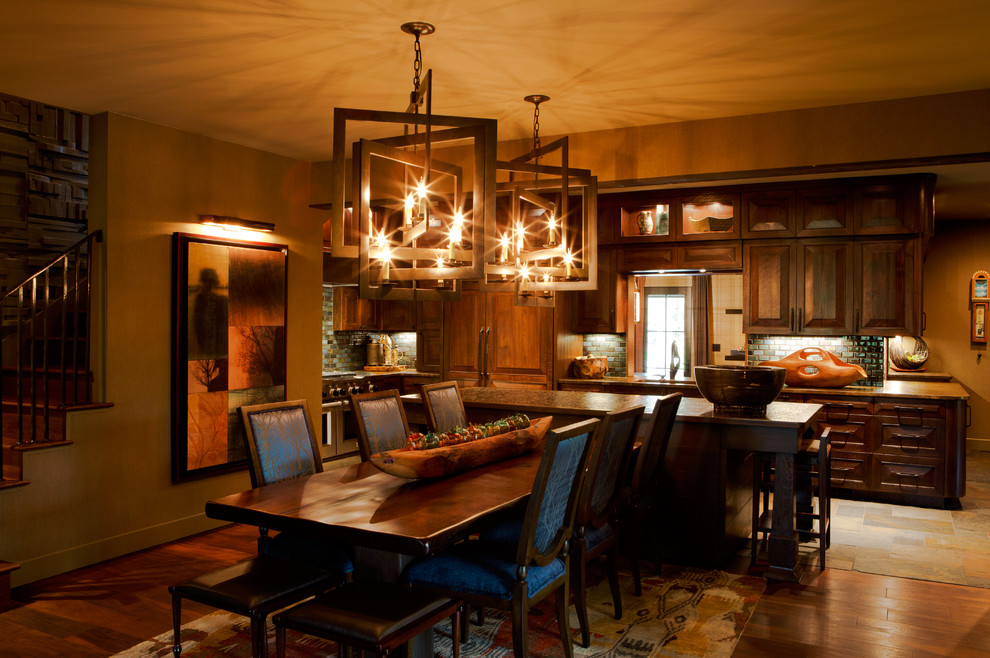 Large transitional medium tone wood floor kitchen/dining room combo photo with beige walls