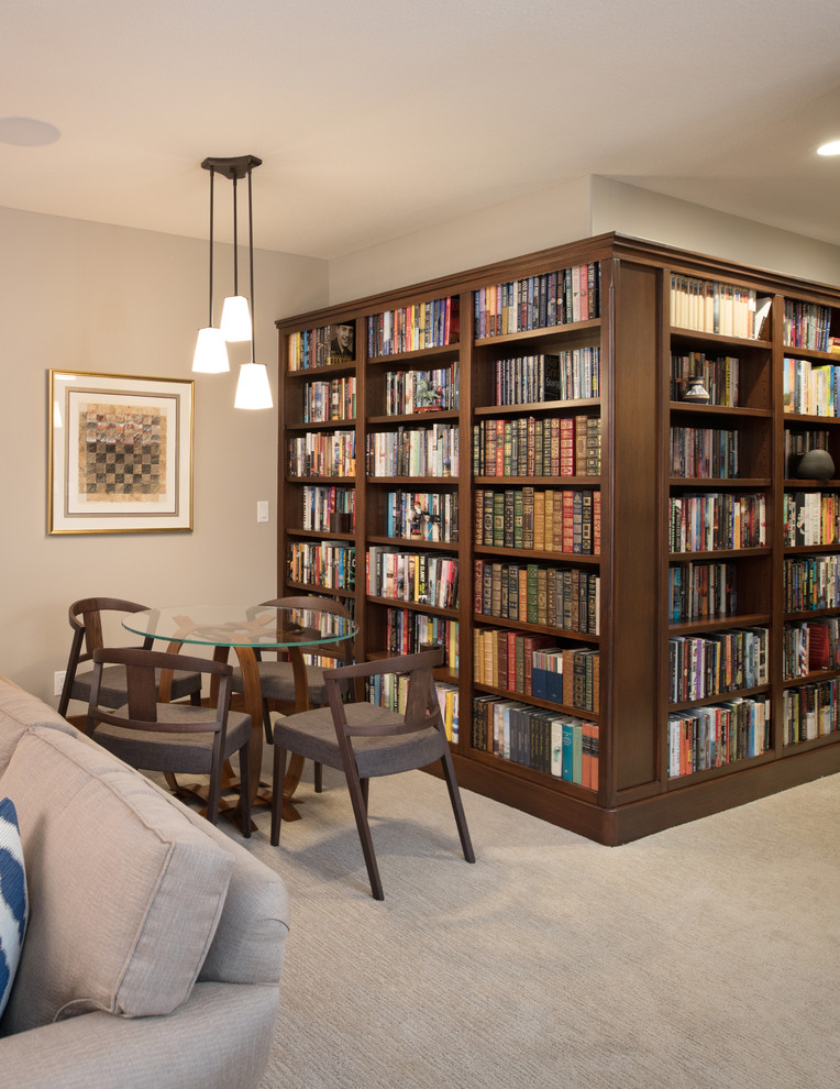 Inspiration for a transitional carpeted basement remodel in Kansas City with gray walls