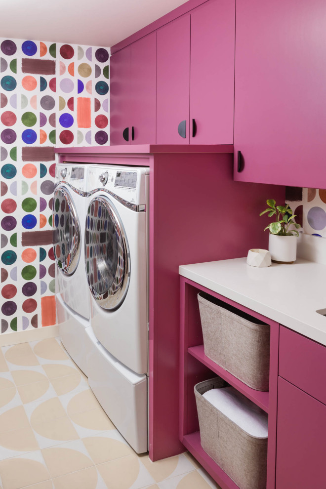 Inspiration for a mid-sized contemporary galley laundry cupboard in San Francisco with an undermount sink, flat-panel cabinets, quartz benchtops, ceramic floors, a side-by-side washer and dryer and white benchtop.
