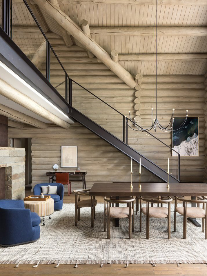 Inspiration for a rustic light wood floor, beige floor and wood ceiling great room remodel with beige walls, a standard fireplace and a brick fireplace