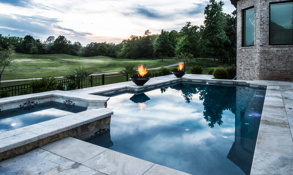 Mid-sized mediterranean backyard pool in Little Rock with a hot tub and natural stone pavers.