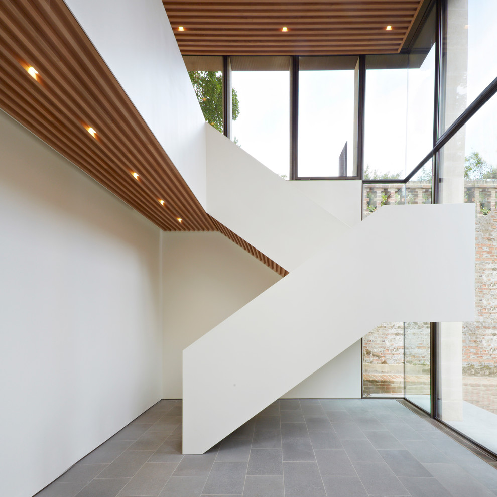 Photo of a contemporary u-shaped staircase in London.