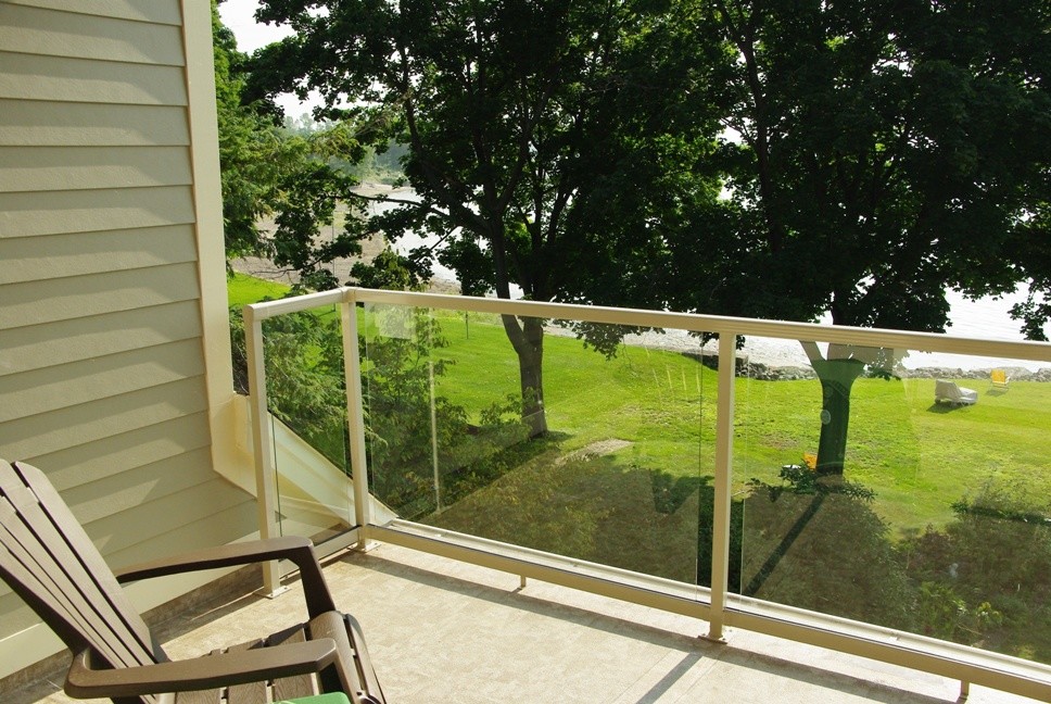 Deck - mid-sized backyard balcony deck idea with no cover