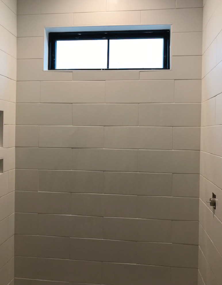 Shower wall tile lippage done an redone and still problems!! Advice!