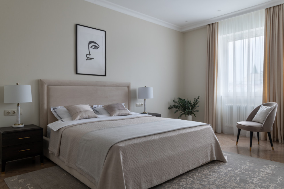 Inspiration for a large transitional master bedroom in Moscow with yellow walls, medium hardwood floors, no fireplace, beige floor and wallpaper.