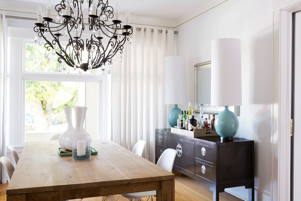 Design ideas for a transitional dining room in Los Angeles with white walls.