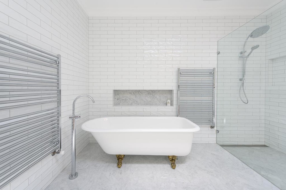 Inspiration for a large traditional bathroom in Melbourne with flat-panel cabinets, white cabinets, a claw-foot tub, white tile, ceramic tile, white walls, marble floors, a vessel sink, marble benchtops, multi-coloured floor and a one-piece toilet.