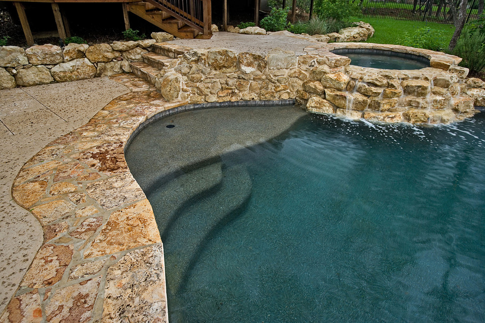 Example of a mid-sized mountain style pool design