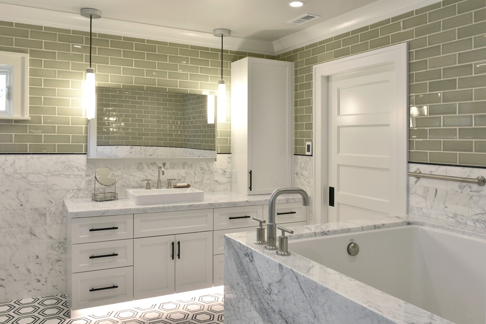 Transitional master bathroom in Other with flat-panel cabinets, white cabinets, a corner tub, a curbless shower, a one-piece toilet, green tile, ceramic tile, white walls, marble floors, a vessel sink, marble benchtops, white floor, a hinged shower door and white benchtops.