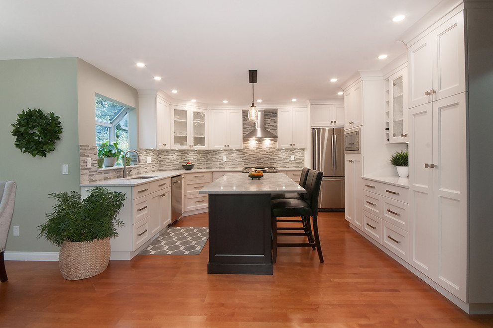 Example of a transitional kitchen design in Vancouver