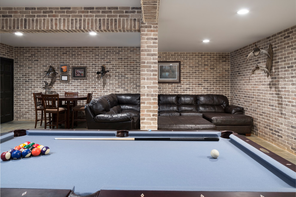 This is an example of an expansive country basement in Other with grey walls.