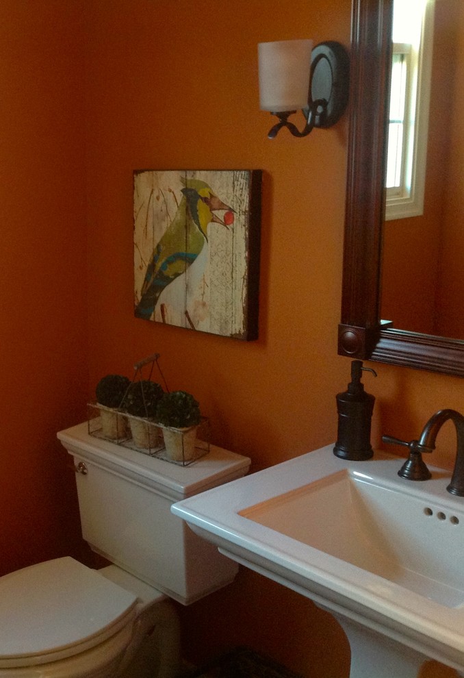Photo of a transitional powder room in Richmond.