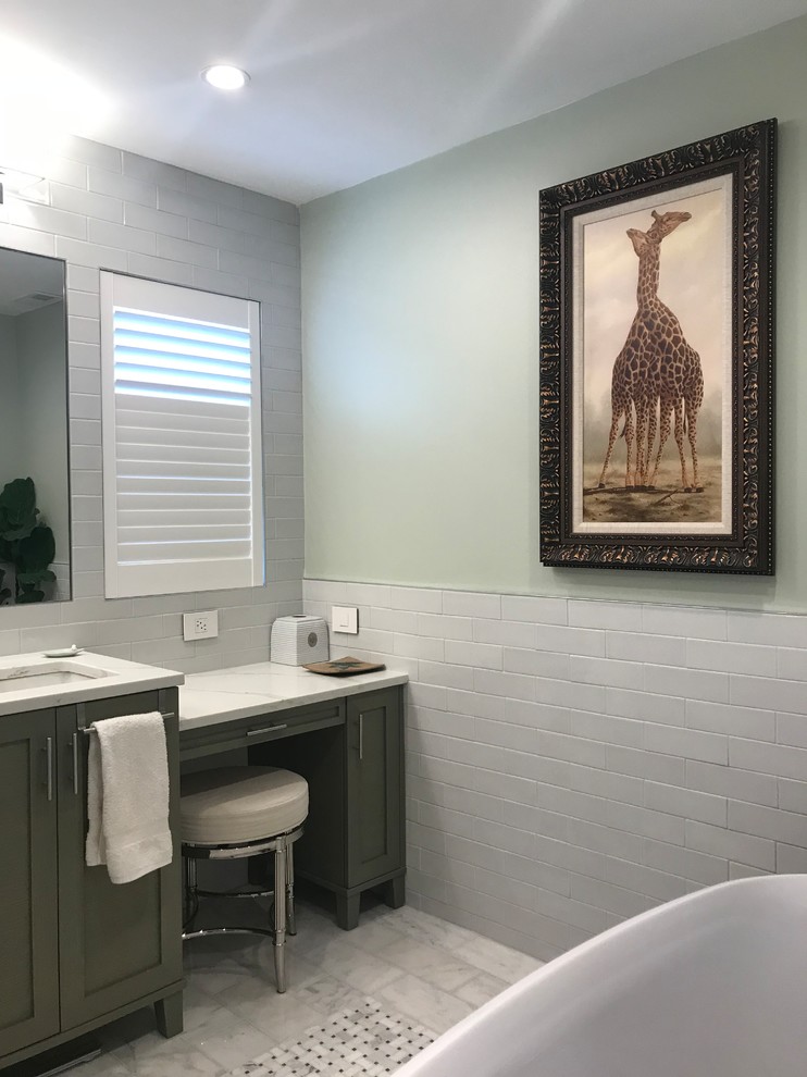 Inspiration for an expansive modern master bathroom in Chicago with a freestanding tub, an open shower, multi-coloured floor, shaker cabinets, grey cabinets, gray tile, subway tile, green walls, marble floors, an undermount sink, marble benchtops and white benchtops.