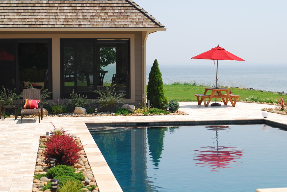 Inspiration for a large transitional backyard stone and rectangular lap hot tub remodel in Baltimore