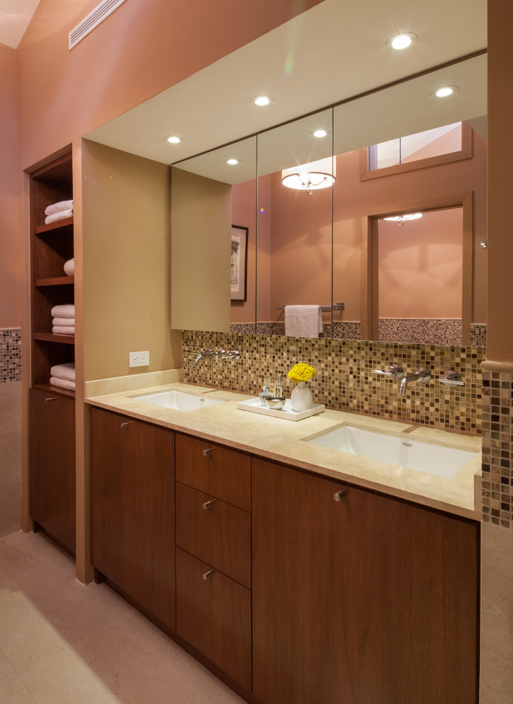 Photo of a large contemporary master bathroom in Other with flat-panel cabinets, medium wood cabinets, marble benchtops, multi-coloured tile, mosaic tile, an undermount sink, orange walls and marble floors.