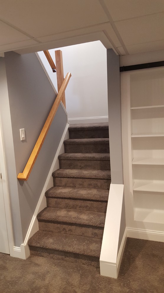Design ideas for a mid-sized transitional staircase in Philadelphia.
