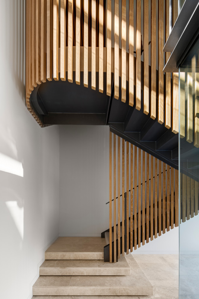 Design ideas for a contemporary u-shaped staircase in Sydney with metal railing.