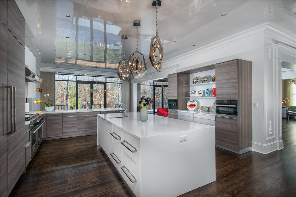 This is an example of a contemporary kitchen in New York with flat-panel cabinets, brown cabinets, white splashback, stainless steel appliances, dark hardwood floors and brown floor.