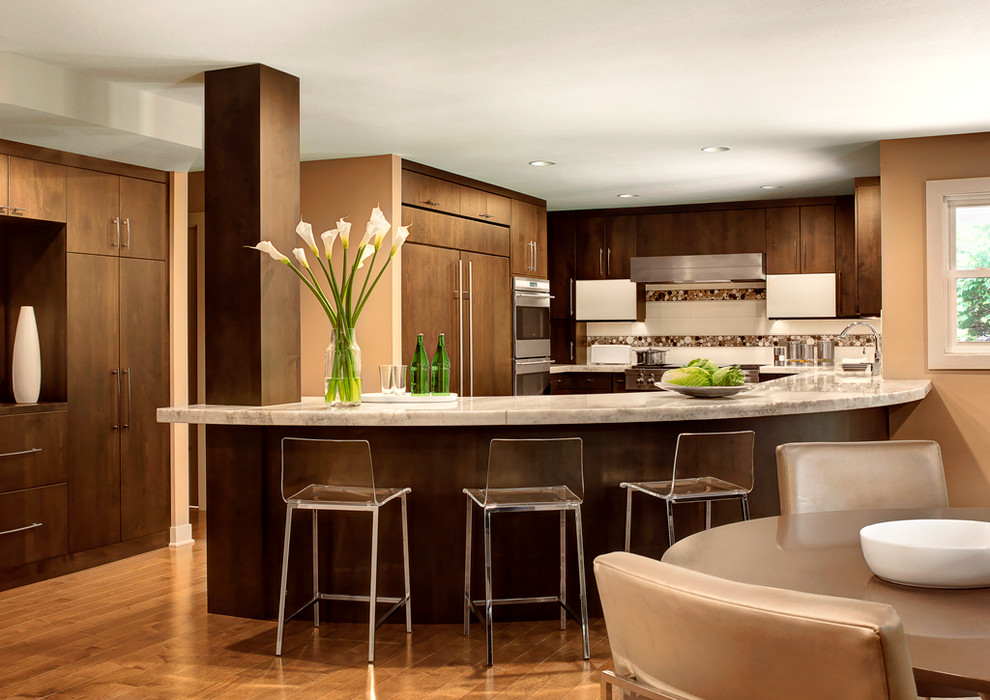 Kitchen - transitional light wood floor kitchen idea in St Louis with flat-panel cabinets, dark wood cabinets, granite countertops, mosaic tile backsplash, stainless steel appliances and an island