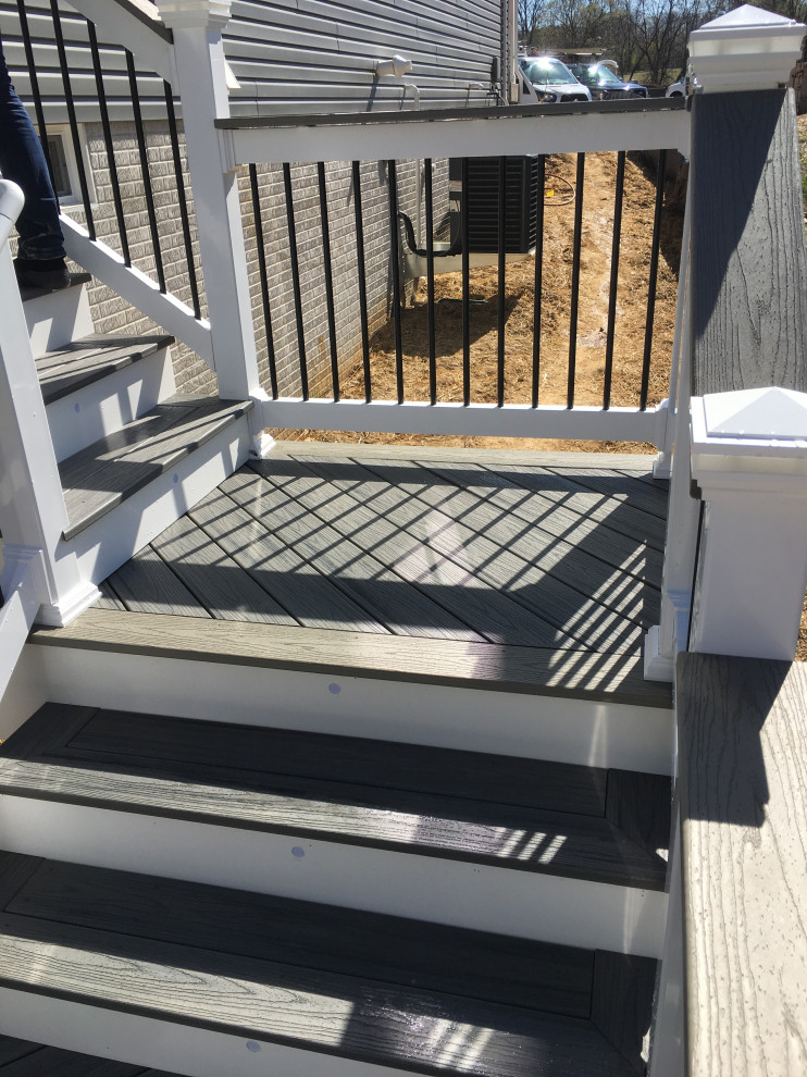Inspiration for a mid-sized backyard second story deck remodel in Baltimore with no cover