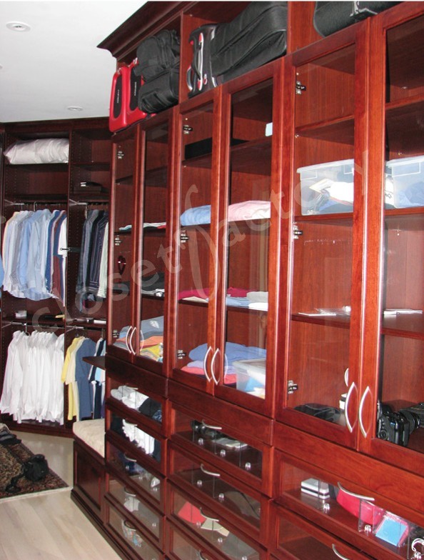 Tall Cherry Cabinets with luggage 
