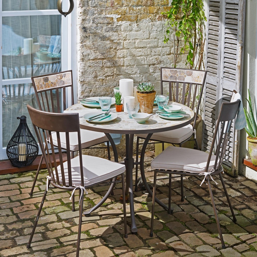 This is an example of a mediterranean patio in London.