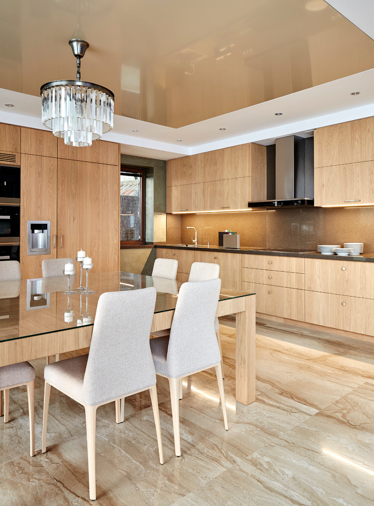 Photo of a large contemporary eat-in kitchen in Other with flat-panel cabinets, light wood cabinets and brown splashback.