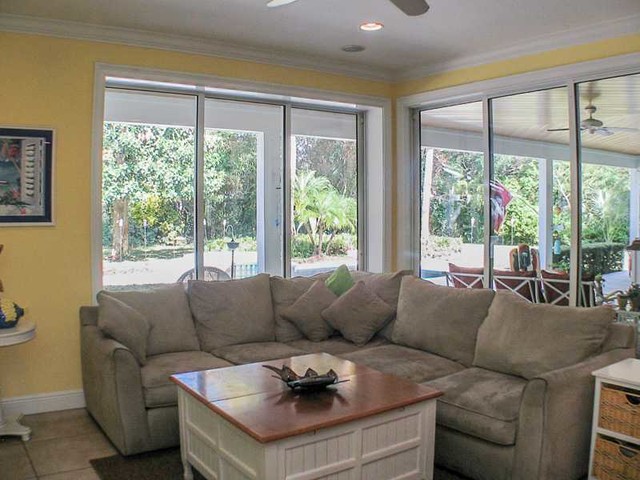 Florida Casual Custom Home tropical-living-room