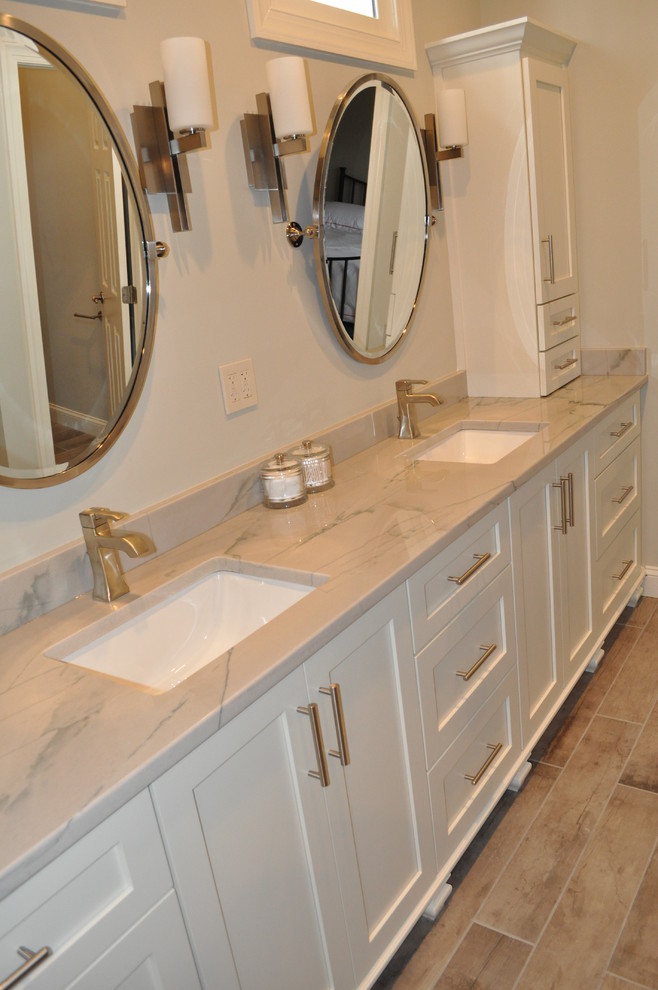 Design ideas for a large traditional master bathroom in Atlanta with white cabinets, a double shower, gray tile, porcelain tile, grey walls, porcelain floors, an undermount sink, quartzite benchtops, shaker cabinets and a two-piece toilet.
