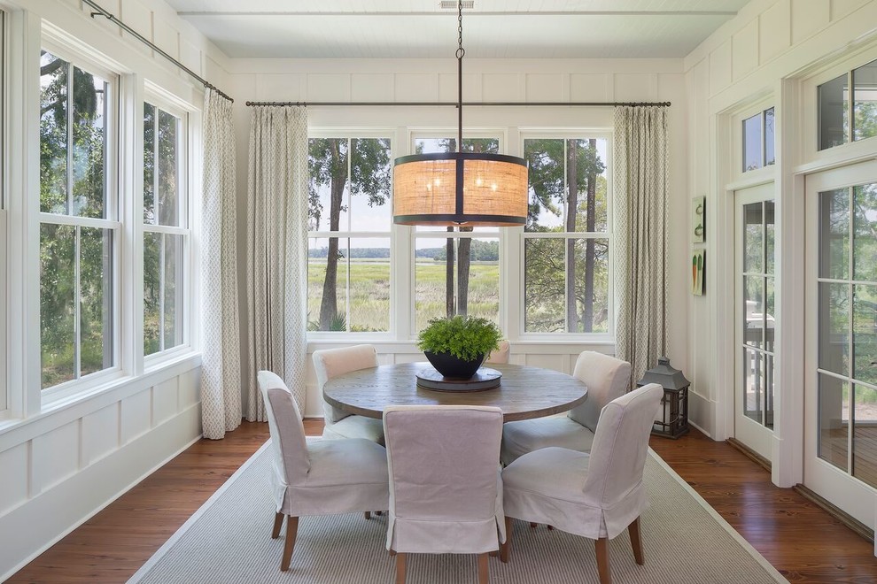Inspiration for a coastal medium tone wood floor and brown floor sunroom remodel in Atlanta with a standard ceiling