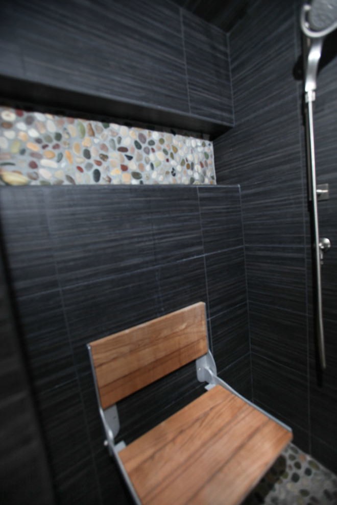 Photo of a mid-sized contemporary 3/4 bathroom in Minneapolis with an open shower, multi-coloured tile and pebble tile.