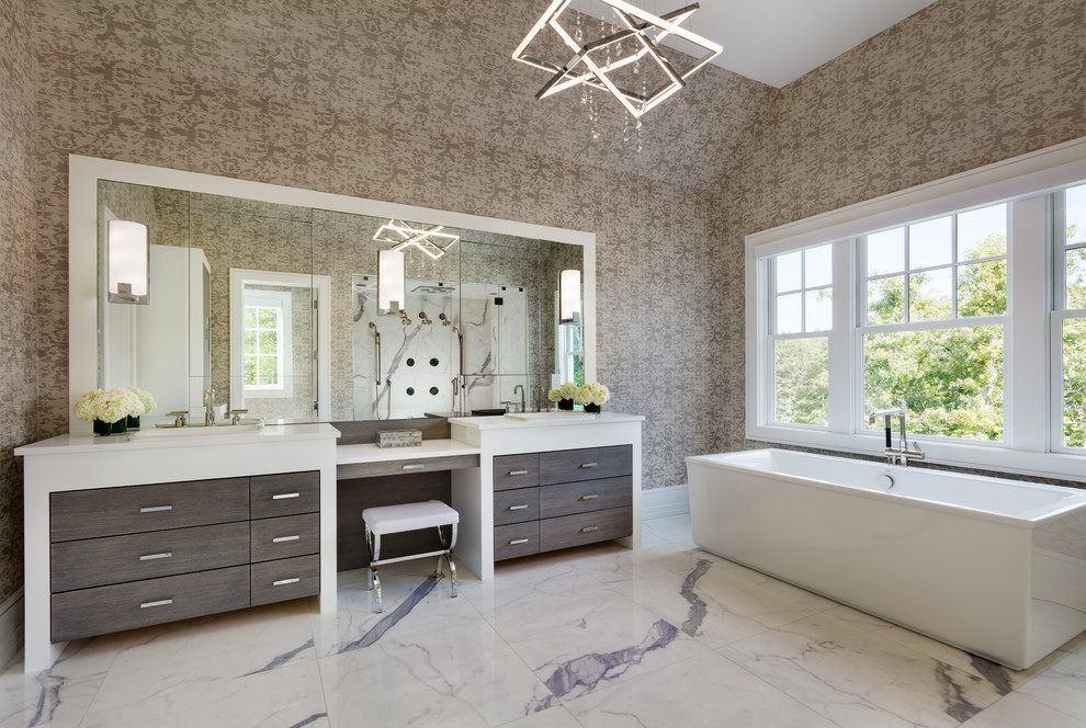 Design ideas for a beach style master bathroom in New York with flat-panel cabinets, dark wood cabinets, a freestanding tub, beige walls and white floor.