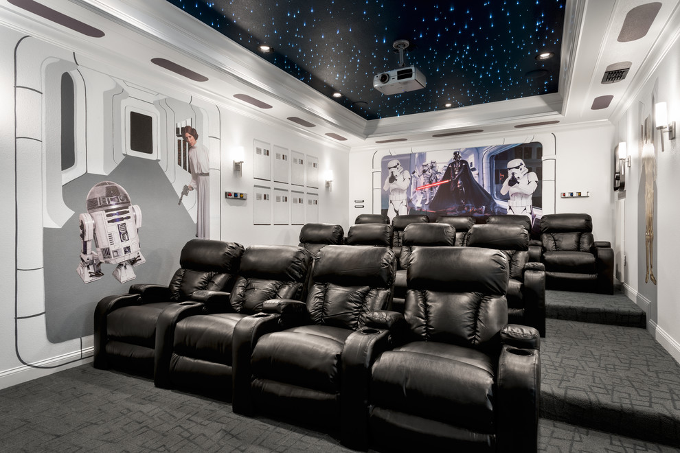 Transitional home theatre in Orlando with white walls, carpet, a projector screen and grey floor.