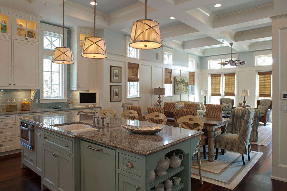Beach style open concept kitchen photo in Other with recessed-panel cabinets, blue cabinets, blue backsplash, subway tile backsplash and a double-bowl sink