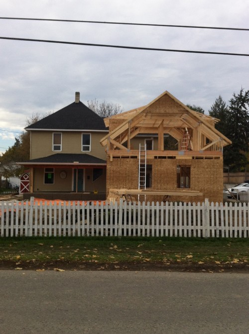 Old Home Door Not Centred We Are Adding An L Shaped Addition With 2 Car Garage And Suite Our View From The Street Front Door Looks Off Center Any Ideas
