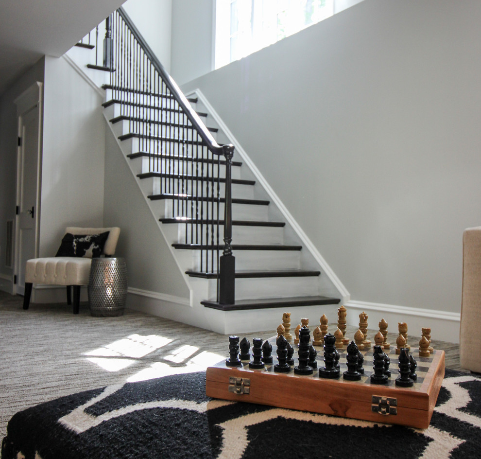 Example of a large transitional wooden l-shaped mixed material railing staircase design in DC Metro with painted risers