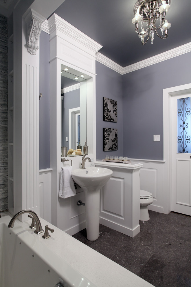 Photo of a large traditional master bathroom in Calgary with raised-panel cabinets, white cabinets, a drop-in tub, gray tile, matchstick tile and grey walls.