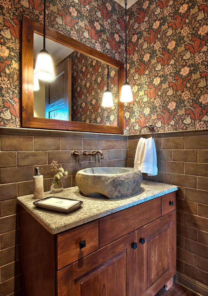 Traditional powder room in Denver with subway tile and a vessel sink.