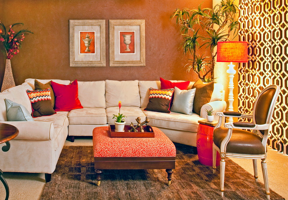 Photo of a mid-sized eclectic enclosed family room in Dallas with brown walls, carpet and a wall-mounted tv.
