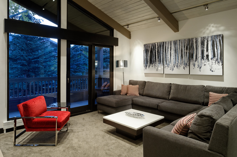 Design ideas for a contemporary enclosed family room in Denver with white walls, carpet, no fireplace and no tv.