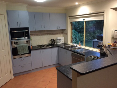 Kitchen Cosmetic Update Also There Is Some Contention On Keeping The High Back Bench Keep It Hides Messy Kitchen From Seated Guests Or Extend Wider And Accommodate