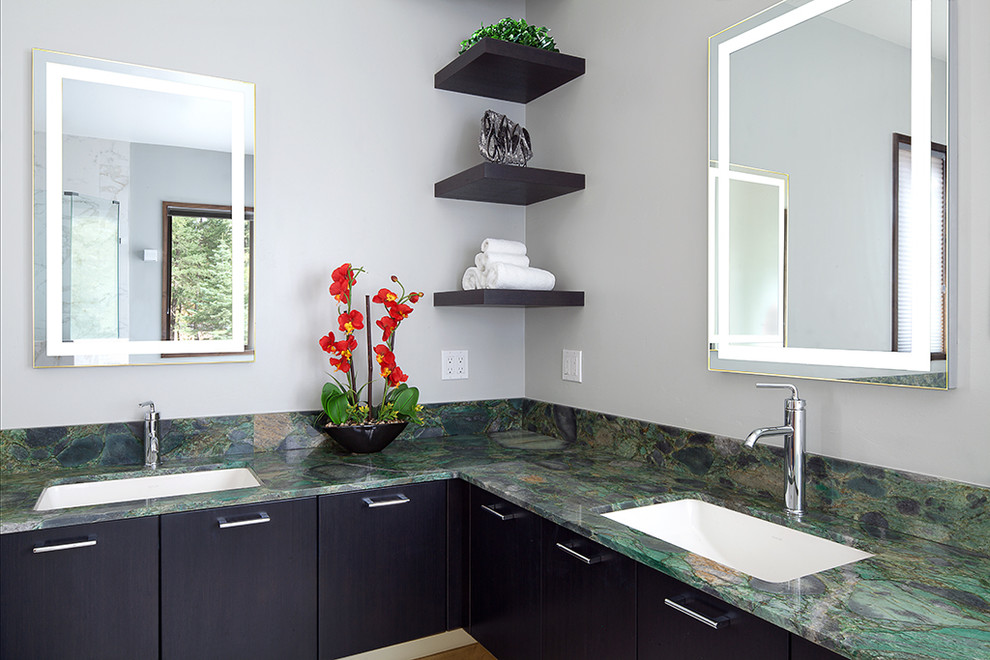 Inspiration for a large contemporary 3/4 bathroom in Albuquerque with an undermount sink, grey cabinets, granite benchtops, a freestanding tub, an open shower, gray tile, cement tile, grey walls and ceramic floors.