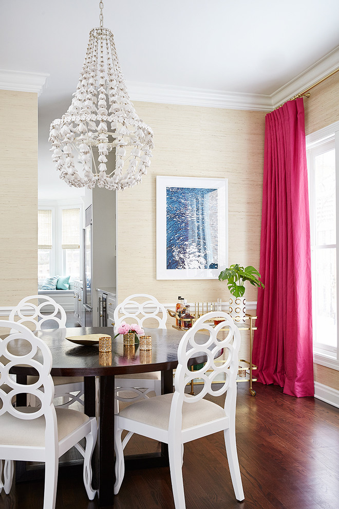 Beach style dining room in New York with beige walls and medium hardwood floors.