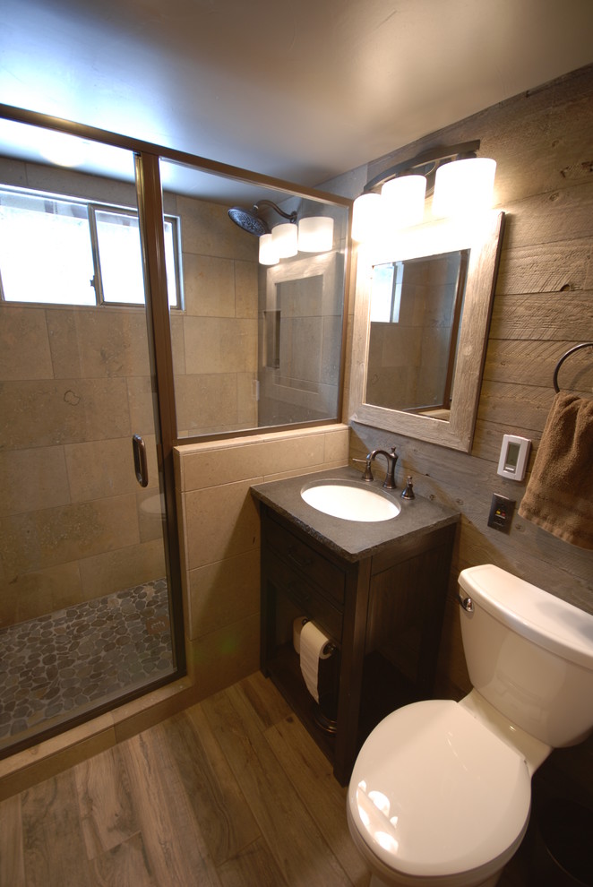 Example of a mountain style home design design in Denver
