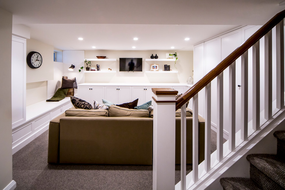 Inspiration for a small transitional look-out carpeted and gray floor basement remodel in Ottawa with beige walls