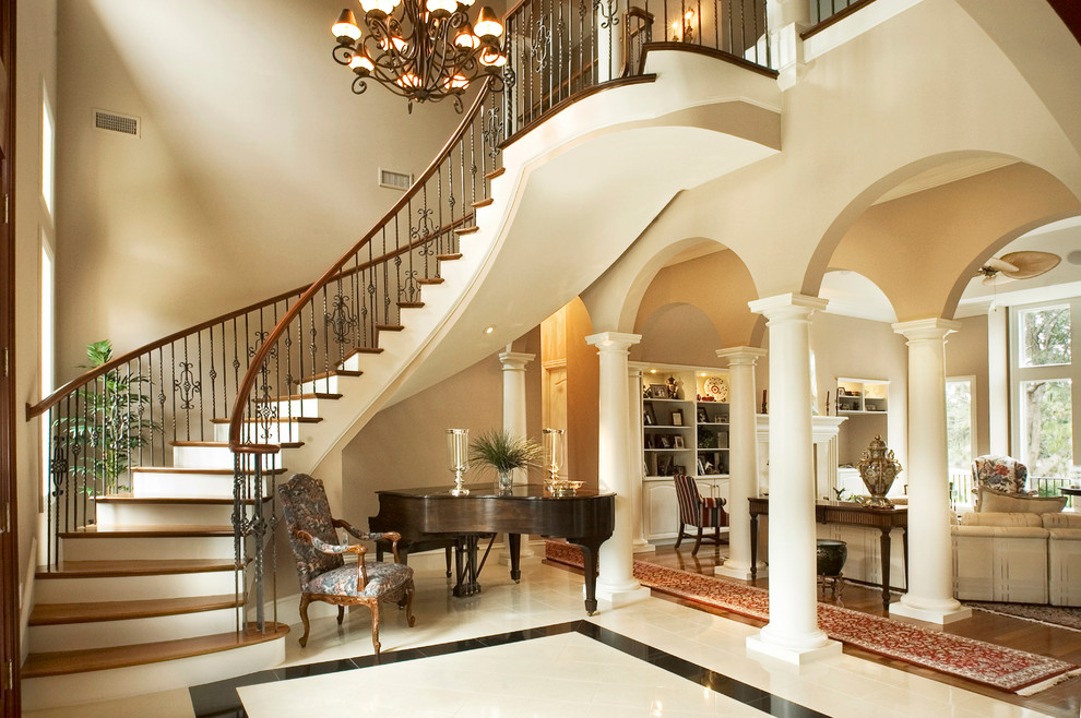 Design ideas for an expansive contemporary foyer in Charleston with beige walls.